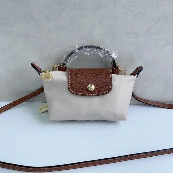 Longchamp Handbags - 💋Longchamp Cream Mini Crossbody Bag